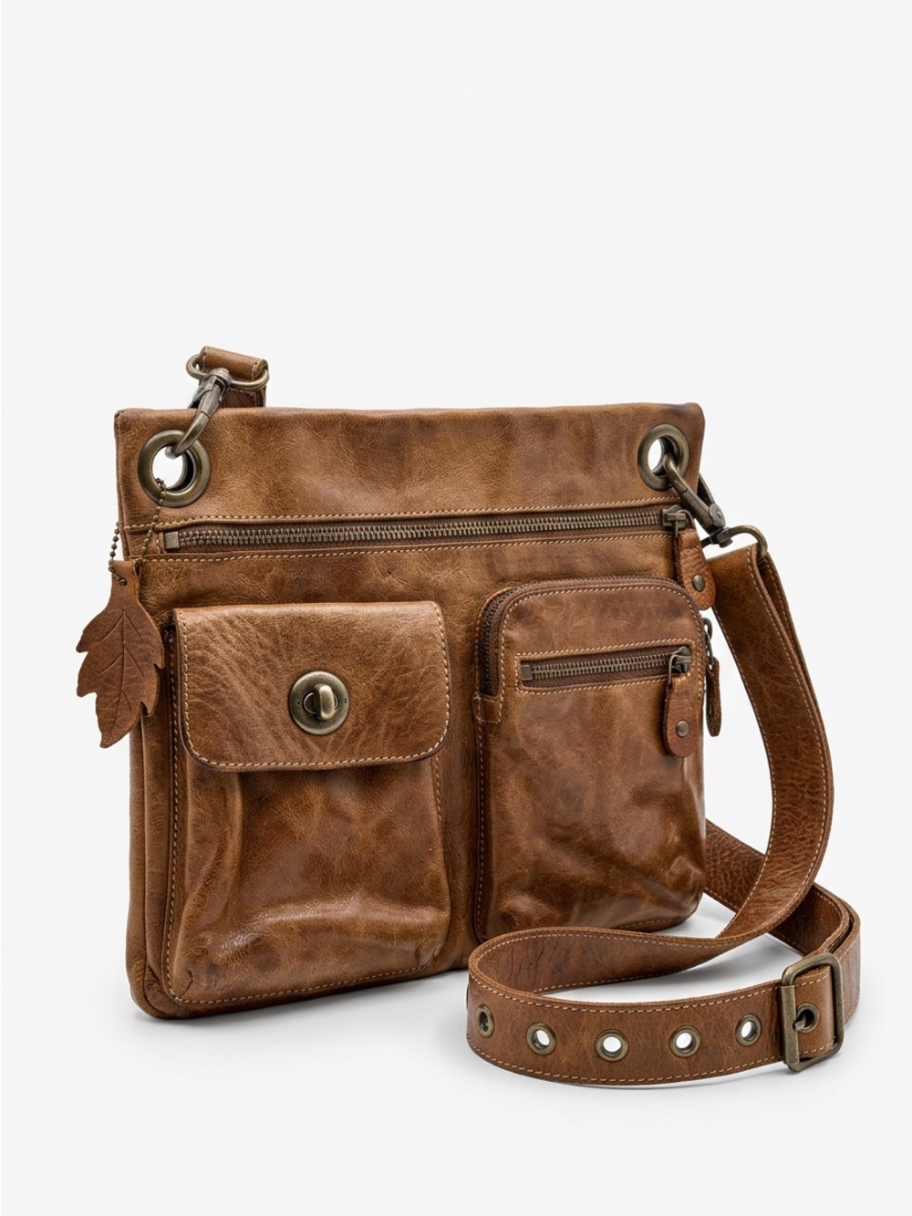ROOTS GENUINE LEATHER SLING BAG - SOLD AS IS